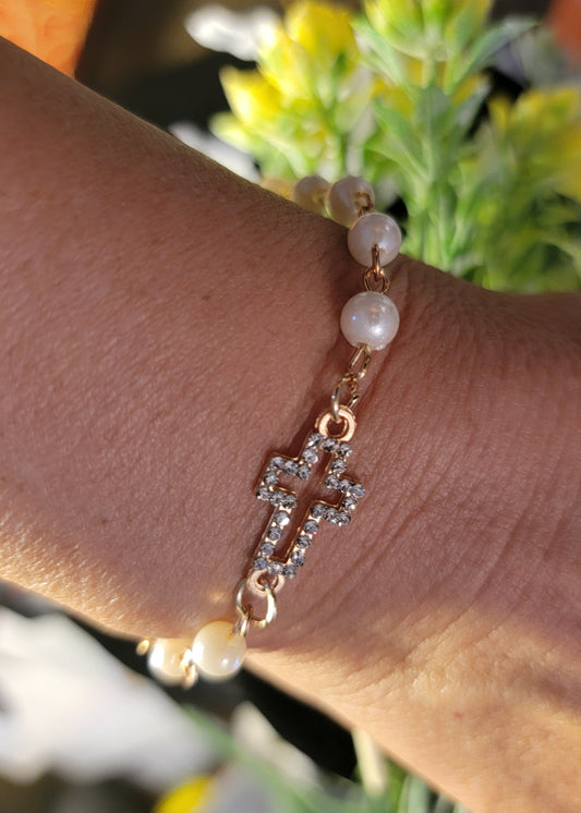 Pearl and cross gold bracelet