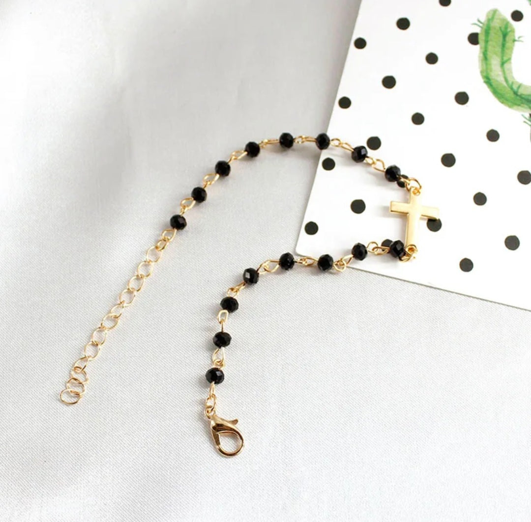 Gold Bracelet with Black Beads and Cross