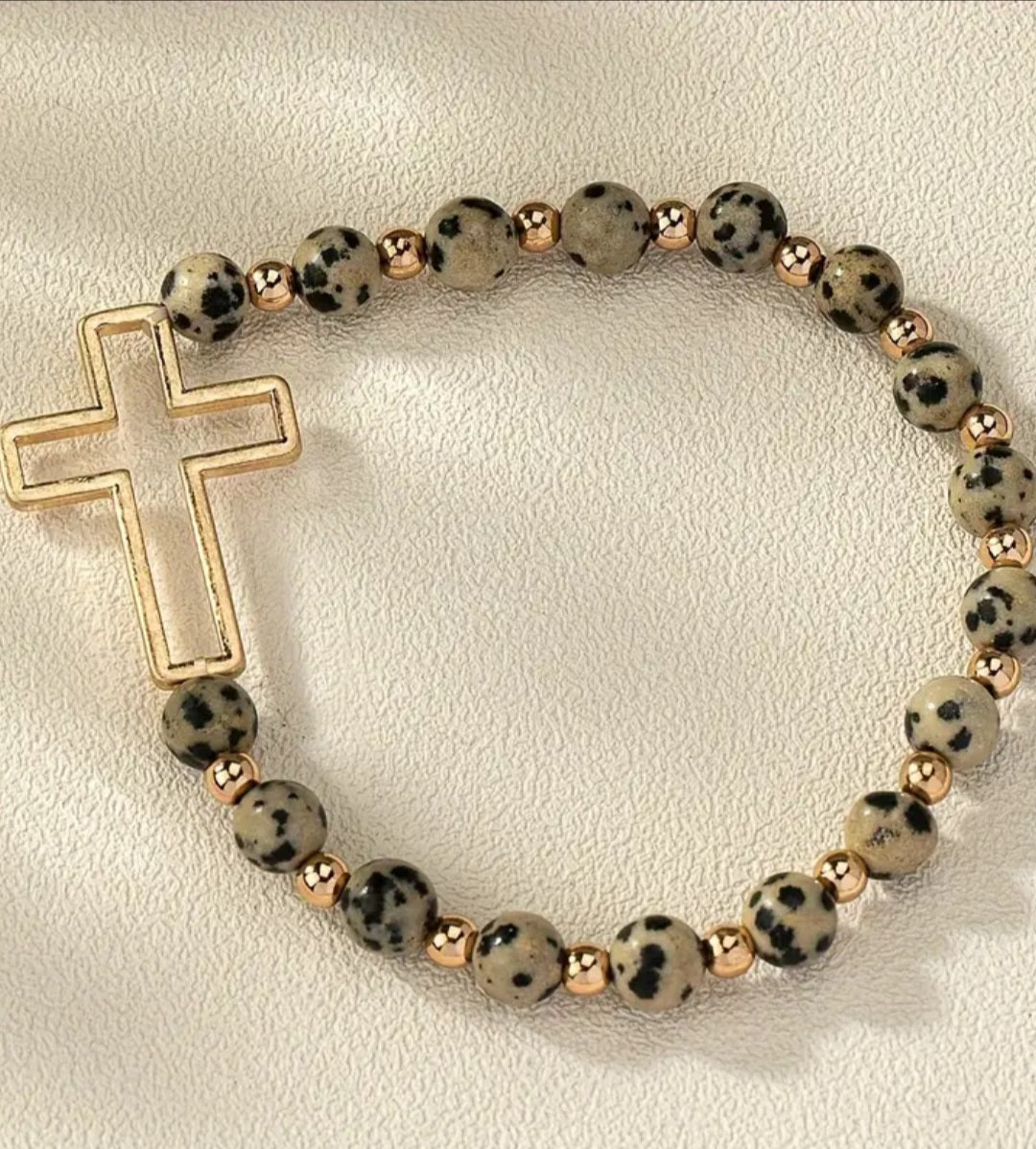 Spotted stone gold cross bracelet