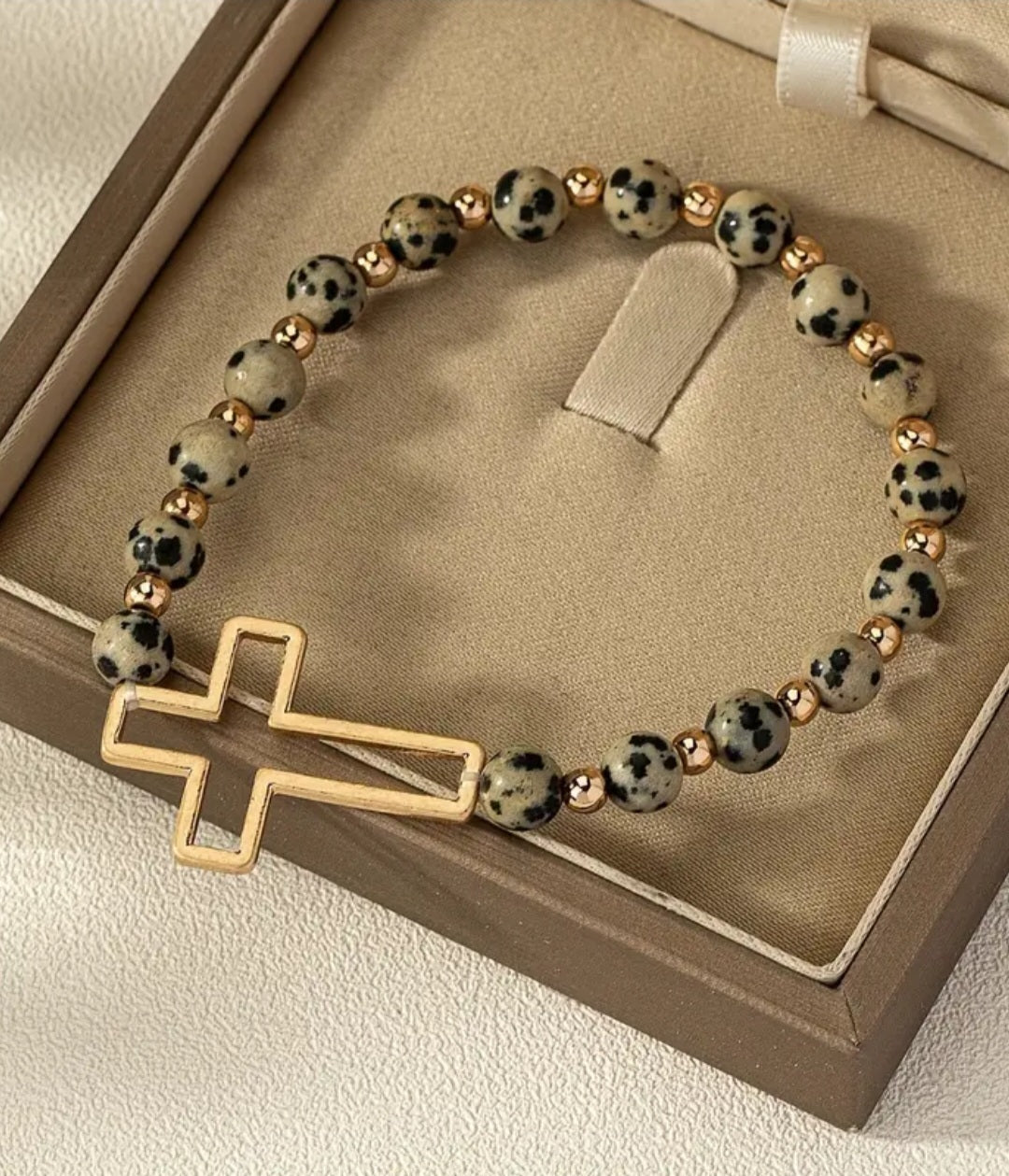Spotted stone gold cross bracelet