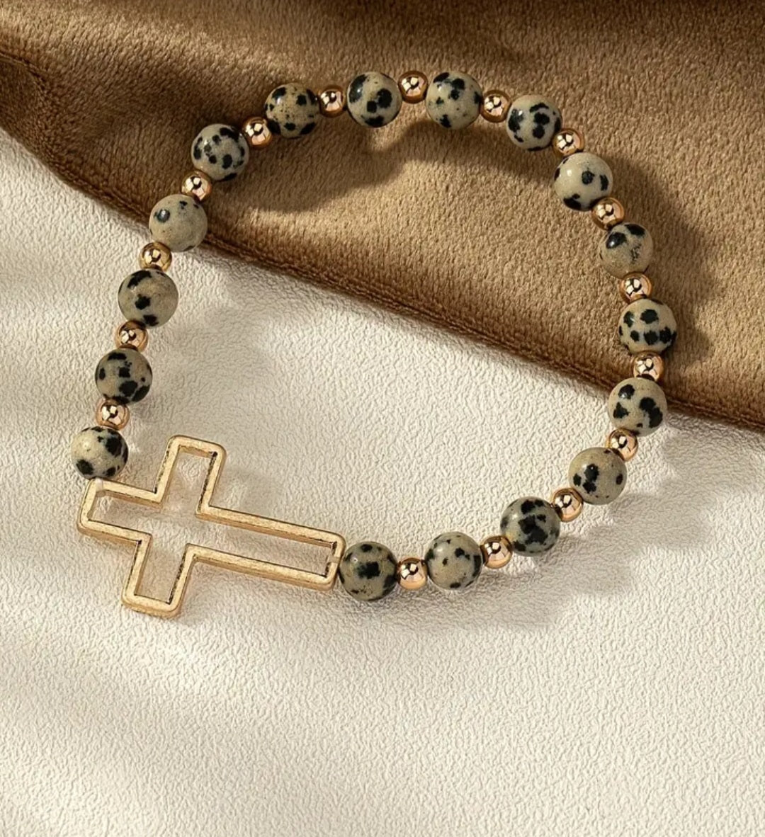 Spotted stone gold cross bracelet