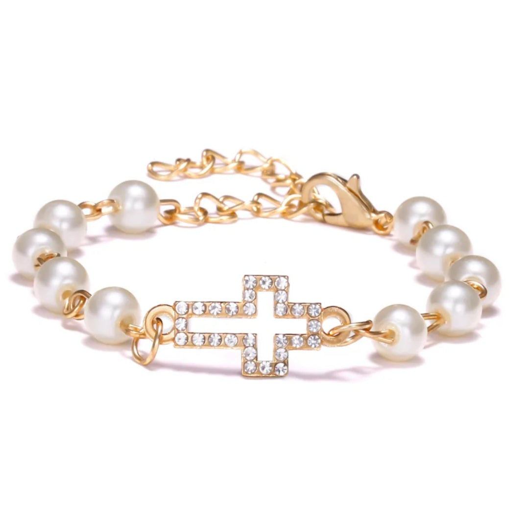 Pearl and cross gold bracelet