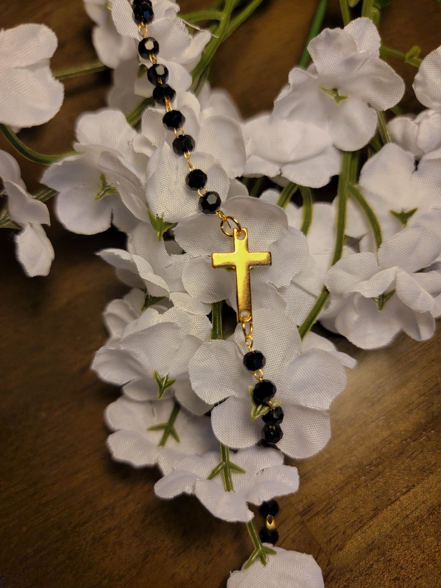 Gold Bracelet with Black Beads and Cross