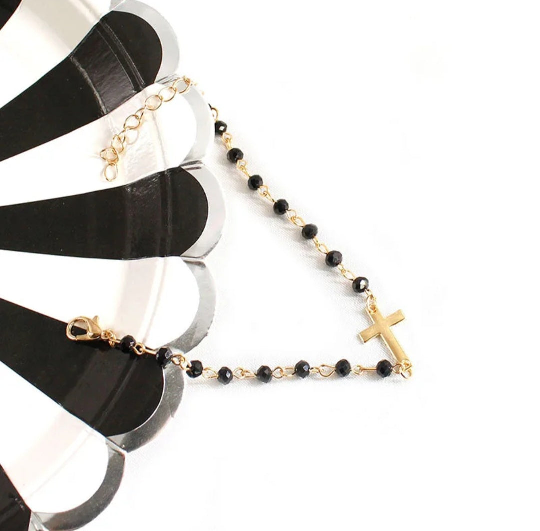 Gold Bracelet with Black Beads and Cross