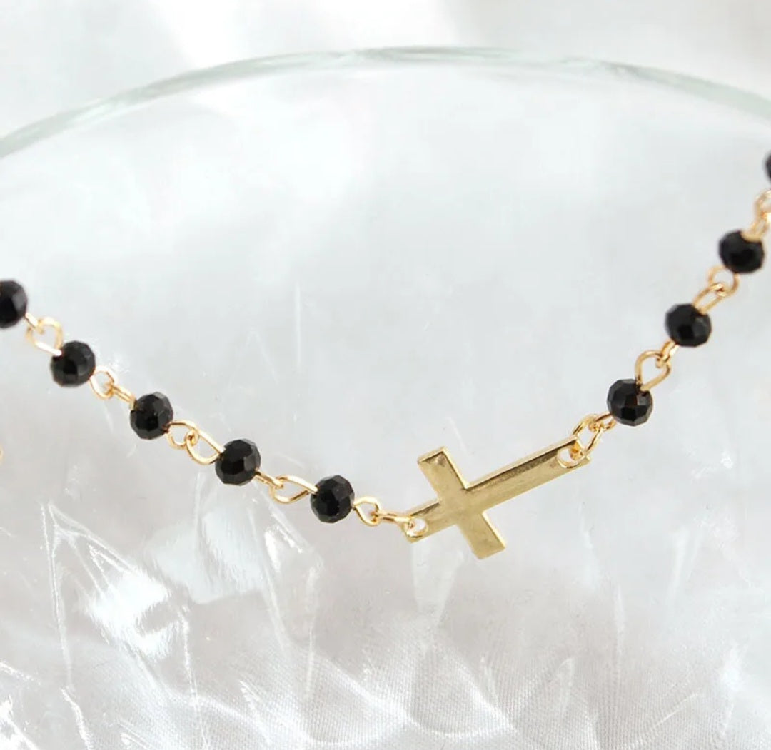 Gold Bracelet with Black Beads and Cross