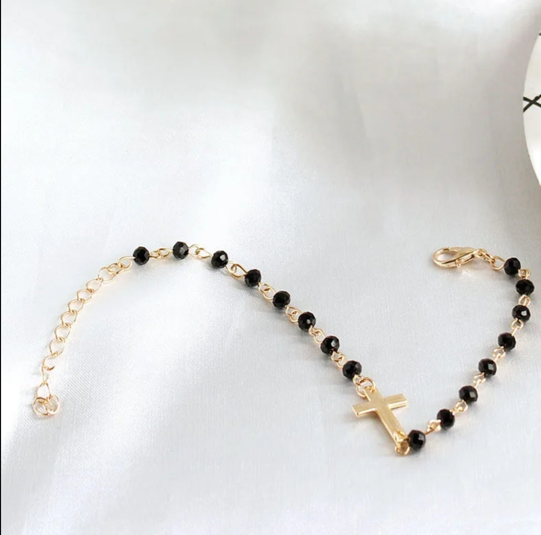 Gold Bracelet with Black Beads and Cross